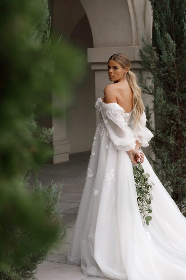 Martina Liana 1593 Wedding Dress - A Line silhouette with 3d floral lace, detachable off the shoulder sleeves, sweetheart bodice and plunging neckline