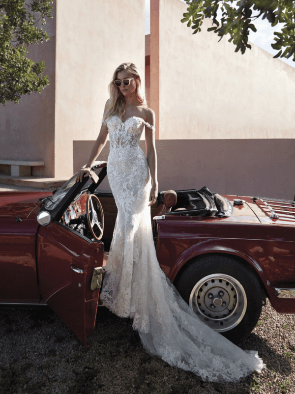 Pronovias Phuket Wedding Dress - Mermaid dress with off the shoulder sleeveless illusion bodice, embellishment and floral lace texture.