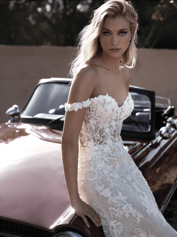 Pronovias Phuket Wedding Dress - Mermaid dress with off the shoulder sleeveless illusion bodice, embellishment and floral lace texture.