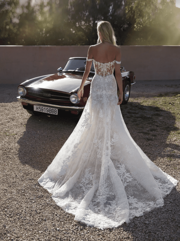 Pronovias Phuket Wedding Dress - Mermaid dress with off the shoulder sleeveless illusion bodice, embellishment and floral lace texture.