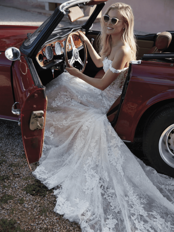 Pronovias Phuket Wedding Dress - Mermaid dress with off the shoulder sleeveless illusion bodice, embellishment and floral lace texture.