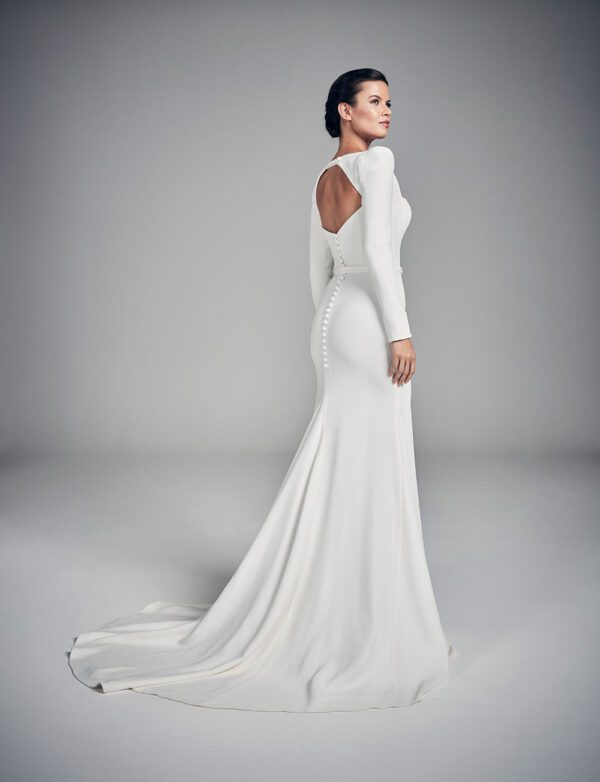 Suzanne Neville Amber Wedding Dress - A-Line wedding dress with a squared neckline, Long Sleeves and a belt detail at Waistline Back
