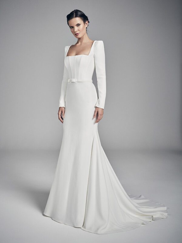 Suzanne Neville Amber Wedding Dress - A-Line wedding dress with a squared neckline, Long Sleeves and a belt detail at Waistline Front