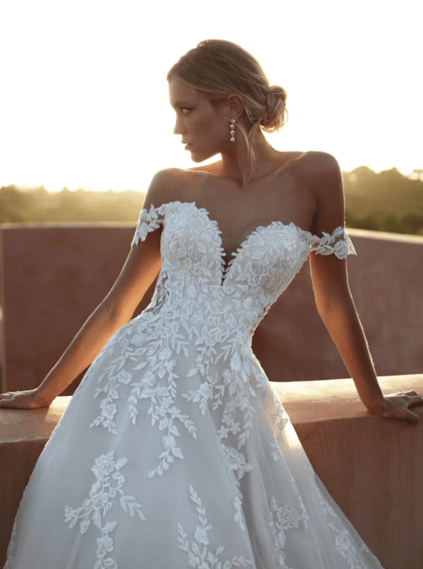 Pronovias Elysees Wedding Dress Sample Sale - A Line with off the shoulder, allover floral appliqué, Semi-illusion bodice, sweetheart neckline and train.
