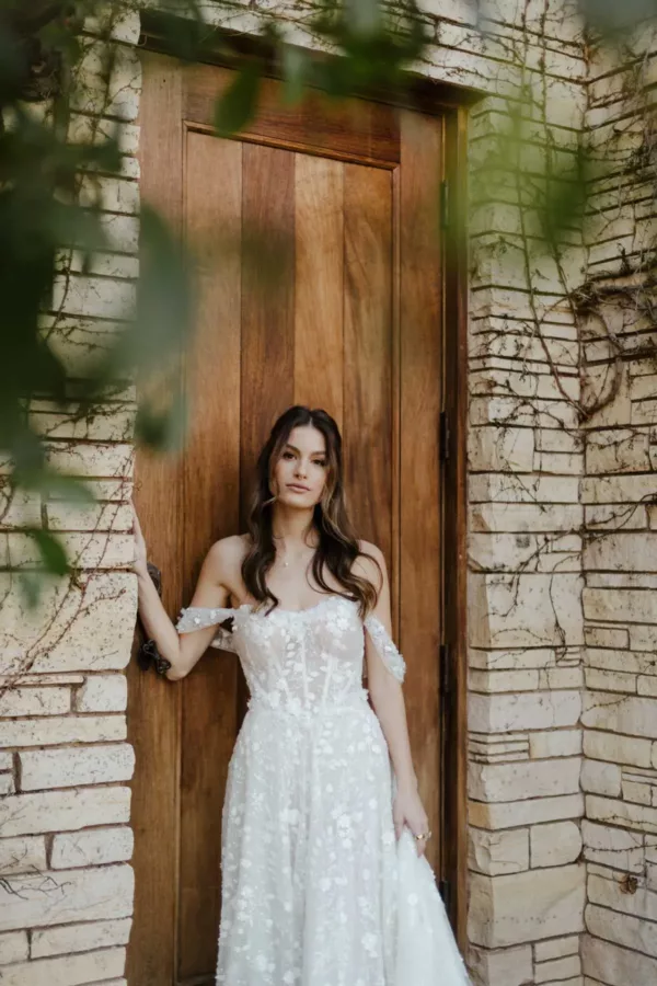 Martina Liana 1598 Wedding Dress - A Line with allover 3D florals lace and pearls, detachable embellished off the shoulder straps, and sweetheart neckline. 