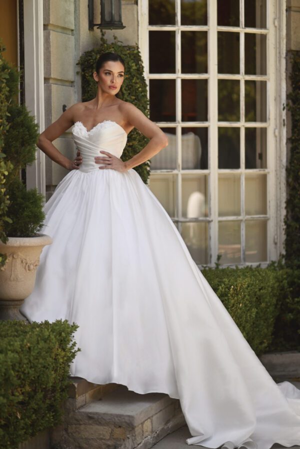 Martina Liana 1701 Wedding Dress - Ball gown with 3D flower appliqués on sweetheart neckline, draped detail bodice and big princess style skirt.