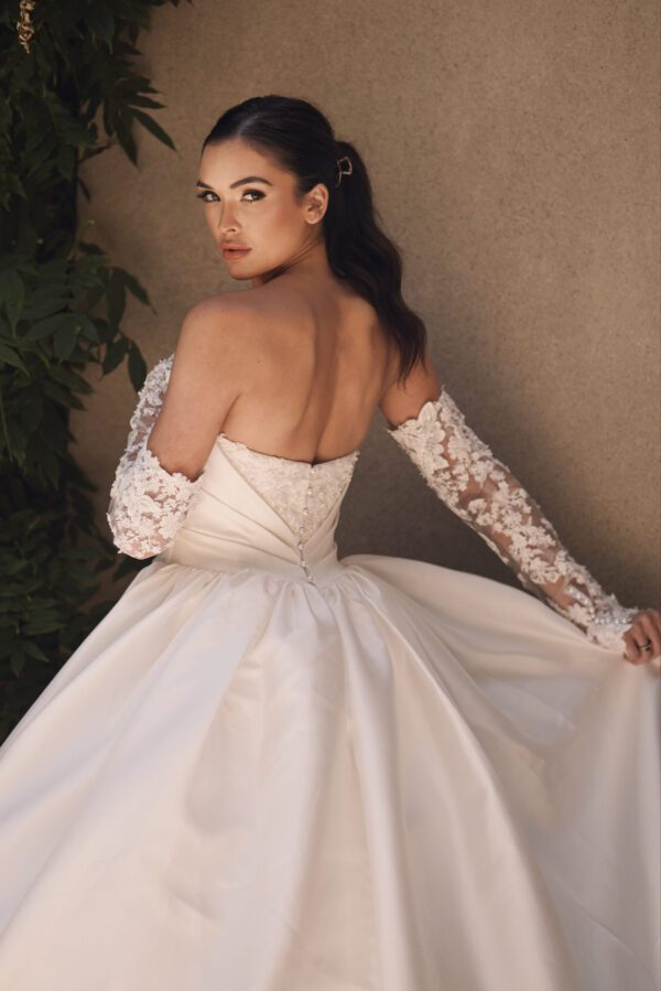 Martina Liana 1701 Wedding Dress - Ball gown with 3D flower appliqués on sweetheart neckline, draped detail bodice and big princess style skirt.