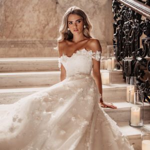 Suzanne Neville Debussy & Overskirt Wedding Dress - A - Line overskirt with a cupped corseted bodices and off the shoulder delicate sleeves in floral tulle.