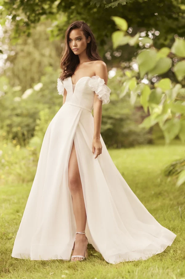 Paloma Blanca 5081 Wedding Dress - A Line strapless pleated bodice dress with sweetheart neckline. Detachable sleeves, skirt with side slit and belt.