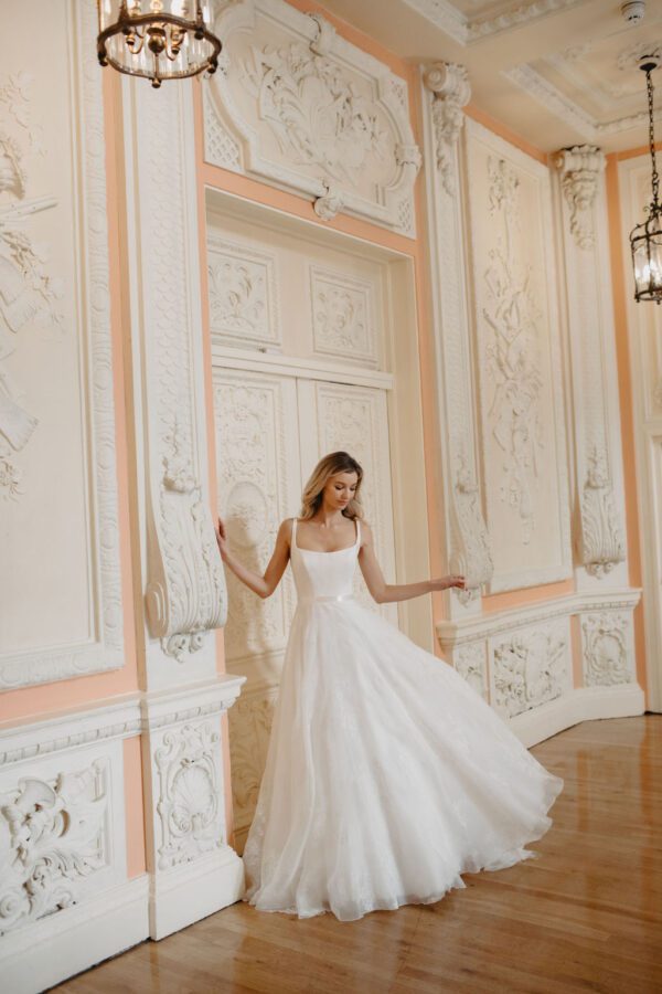 Suzanne Neville Faure Wedding Dress - A Line style dress with square neck corseted bodice, dainty straps and a beautiful floral printed Gazaar skirt. 