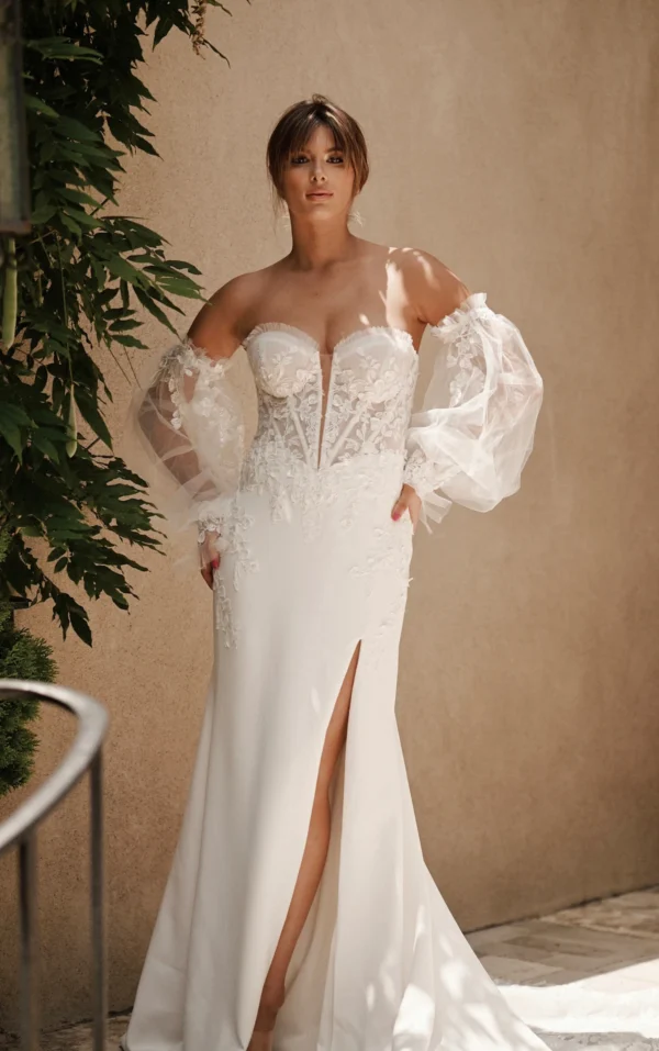 Martina Liana 1710 Wedding Dress - Fit and flare dress with strapless sweetheart neckline, bustier bodice exposes corset, hand placed lace appliqués.