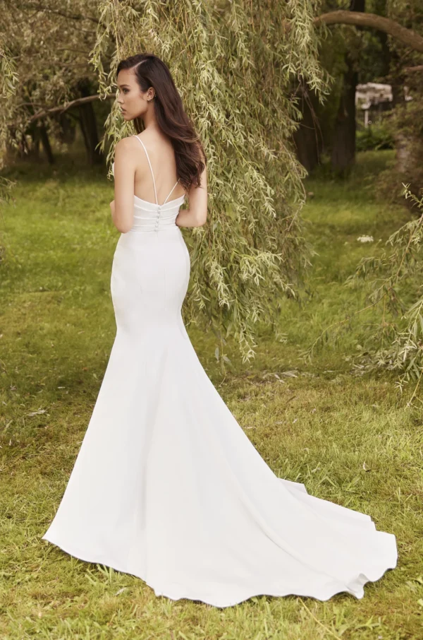 Paloma Blanca 5088 Wedding Dress - Spaghetti strap draped Charmeuse bodice with sweetheart neckline. Fabric covered buttons from center back to hem. Charmeuse draped overlap skirt with slit.