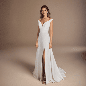Suzanne Neville Bertali Wedding Dress - Off the shoulder wide v-neck corseted bodice with beautiful waist seaming and a flattering crepe skirt with split.