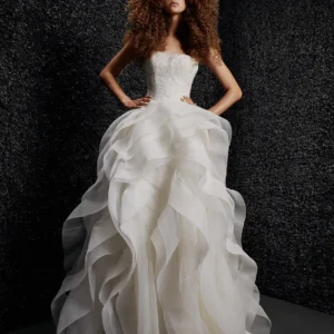 Vera Wang X Pronovias Jeaninne Wedding Dress - Ball gown look with strapless corset bodice, row of buttons at the back and ruffled structure using horsehair bands.