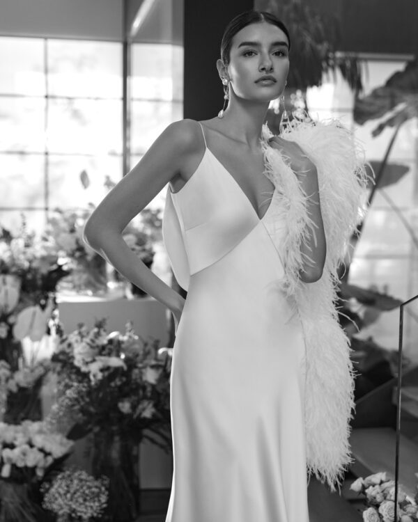 Rosa Clará Mera Wedding Dress - Sheath-style dress featuring a V-neckline, beautiful open back with covered buttons and spaghetti straps.