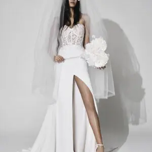 Vera Wang x Pronovias Andie Wedding dress - Fit and flare style dress with sweetheart neckline, illusion corset bodice in lace, and front slit.