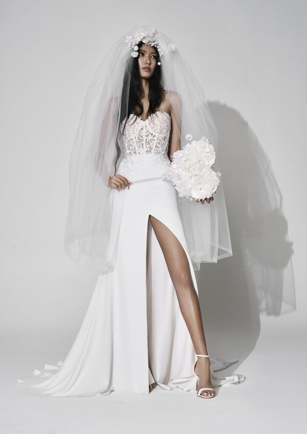 Vera Wang x Pronovias Andie Wedding dress - Fit and flare style dress with sweetheart neckline, illusion corset bodice in lace, and front slit.