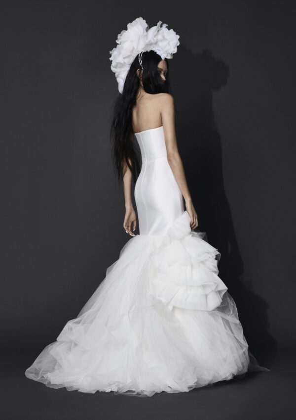 Vera Wang Haimi Wedding Dress - Mermaid style dress with a strapless fitted bodice, low v -neckline, layered tulle skirt and tulle detail on side skirt. 