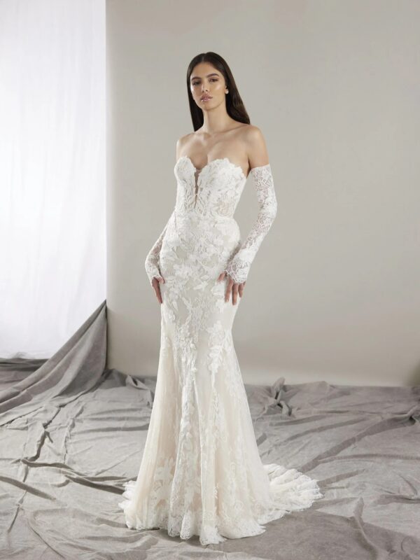 Pronovias Hart Wedding Dress -  Mermaid style dress with a sweetheart neckline, fitted bodice, allover lace, elegant train, and corset detail on the back. 