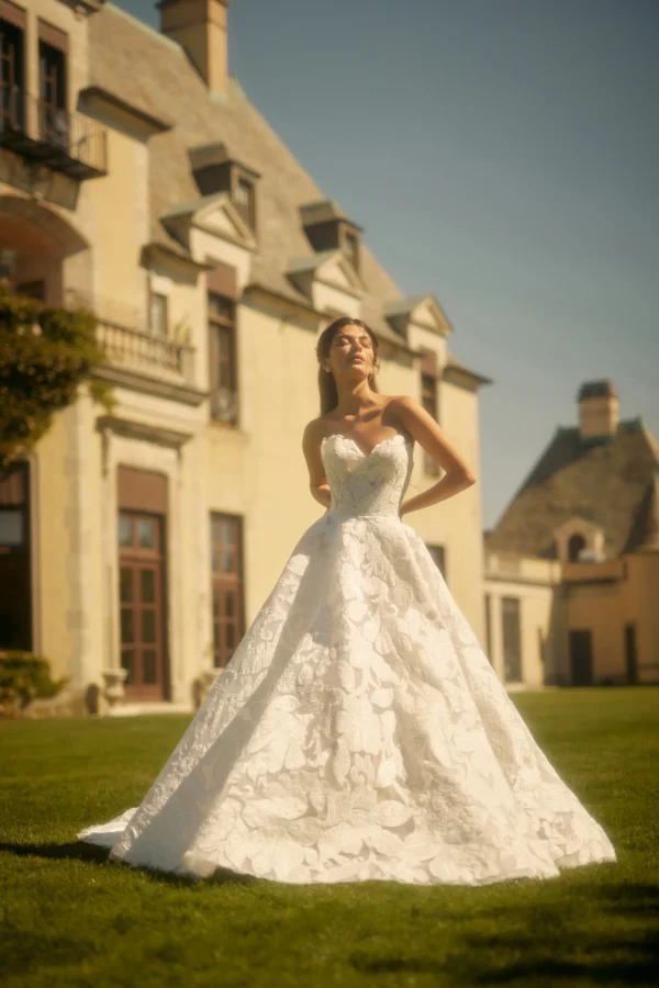 Enaura Florence Wedding Dress - Ballgown style dress with sweetheart neckline, organic hand-cut filigree detail. Botanical-inspired pattern.