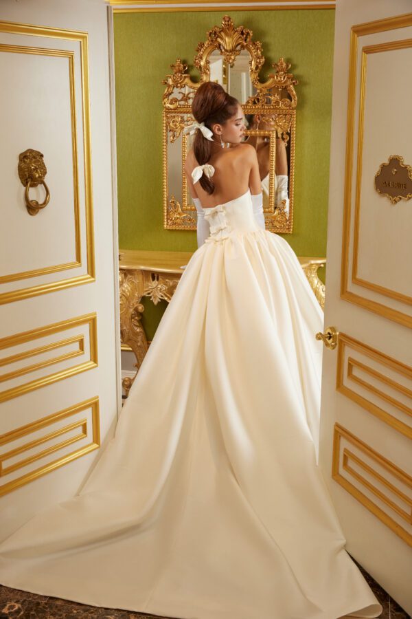 Sareh Nouri Park View Wedding Dress - Italian Mikado cat eye neckline basque waist pleated and gathered ballgown with signature bow accents on back bodice.