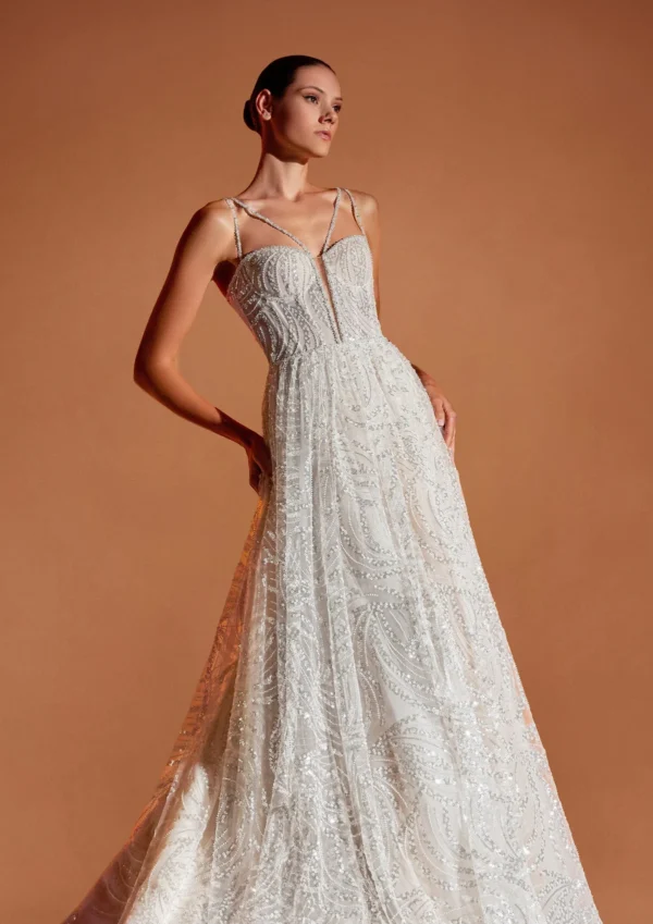 Pronovias Mahall Wedding Dress - A Line with delicate jeweled spaghetti straps, fitted bodice, geometric illusion, sweetheart neckline and cascading skirt. 