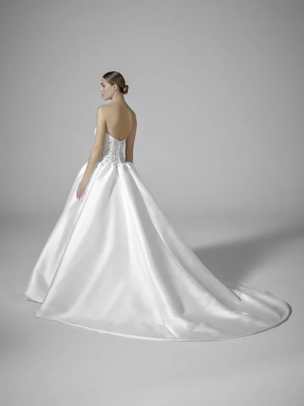 Pronovias Bourgeon Wedding Dress - Princess-cut Ballgown features a reinforced corset-style bodice with a strapless neckline and artistic rose motifs.