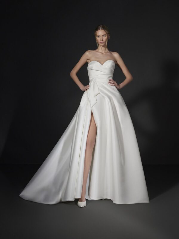 Vera Wang x Pronovias Downtown Wedding dress - A Line style dress with front slit, sweetheart neckline, asymmetrical draped bodice, and train.