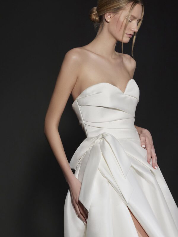 Vera Wang x Pronovias Downtown Wedding dress - A Line style dress with front slit, sweetheart neckline, asymmetrical draped bodice, and train.