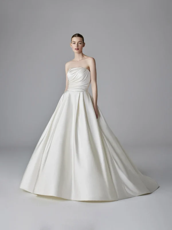 Pronovias Kristin Wedding Dress - Princess design in satin strapless bodice, pleated details on skirt, removable off the shoulder sleeves. 