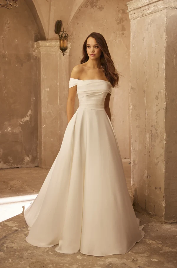 Paloma Blanca P5108 Wedding Dress - A-Line style dress with draped neckline, off the shoulder neckline, pocket, removable sleeves, and draped bodice.