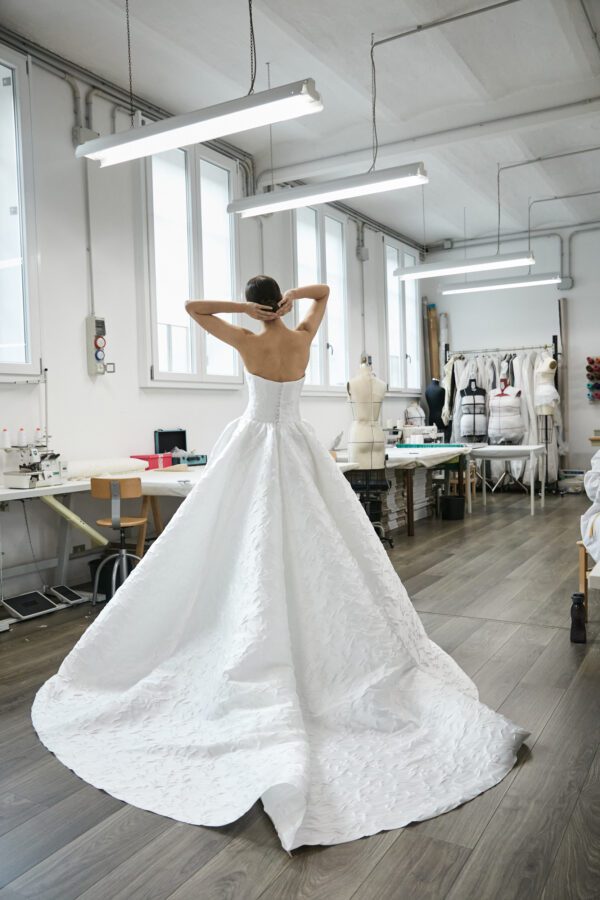 Peter Langner Camilla Wedding Dress - Stunning strapless Ball gown in silk jacquard with 3D Flowers, soft sweetheart neckline, and long train.