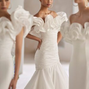 Rosa Clará Tanger Wedding Dress - Sexy mermaid wedding dress made in taffeta. Featuring a strapless neckline, flounced details and a draped bodice.