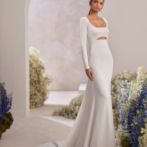 Rosa Clará Trebol Wedding Dress - Modern two-piece mermaid wedding dress made in bistretch crêpe. Showcase a square neckline, closed back and long sleeve. The cut-out embellishment, decorative buttons and detachable bistretch crêpe train complete the look.