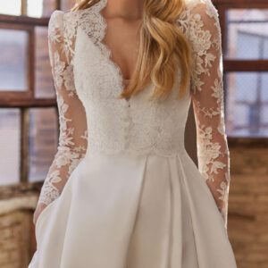 Rosa Clará Wyatt Wedding Jacket - Bridal jacket in rebrodé lace, featuring a plunging neckline, long sleeves and buttoned back.