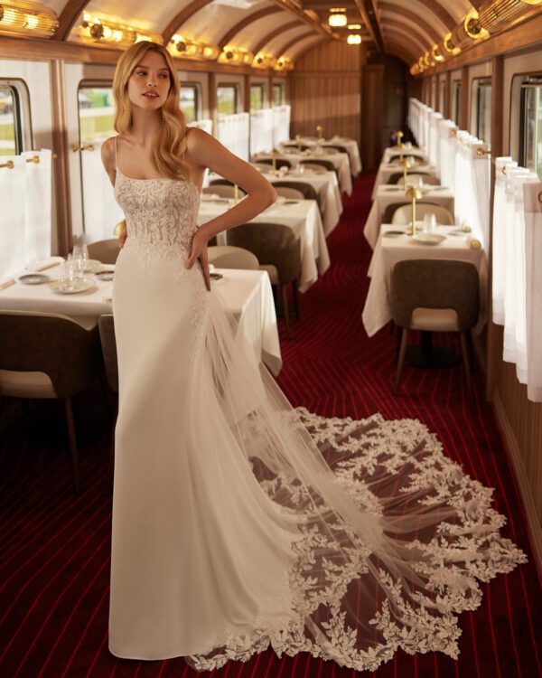 Rosa Clara Vanil Wedding Dress - Romantic two-piece long mermaid wedding dress, crafted in crêpe embellished with lace and beadwork. Featuring a square neckline, open back and a detachable train in tulle and lace.