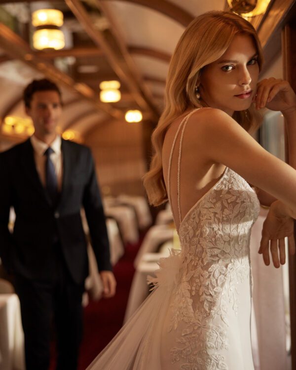 Rosa Clara Vanil Wedding Dress - Romantic two-piece long mermaid wedding dress, crafted in crêpe embellished with lace and beadwork. Featuring a square neckline, open back and a detachable train in tulle and lace.