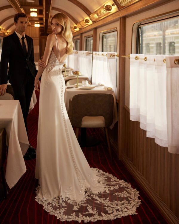 Rosa Clara Vanil Wedding Dress - Romantic two-piece long mermaid wedding dress, crafted in crêpe embellished with lace and beadwork. Featuring a square neckline, open back and a detachable train in tulle and lace.