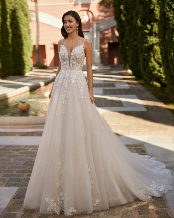 Rosa Clará Ione Wedding Dress - A-line princess wedding dress, crafted in lace combined with tulle. Featuring a plunging neckline, straps, and cut-out back.