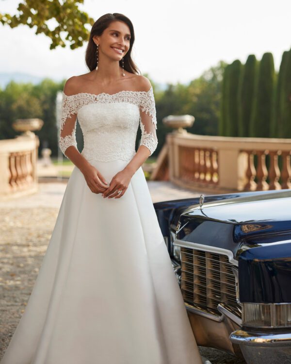 Rosa Clara Dory Wedding Dress - Two-piece A-line dress crafted in Verona mikado. Featuring a strapless neckline, and lace and beadwork bridal jacket.