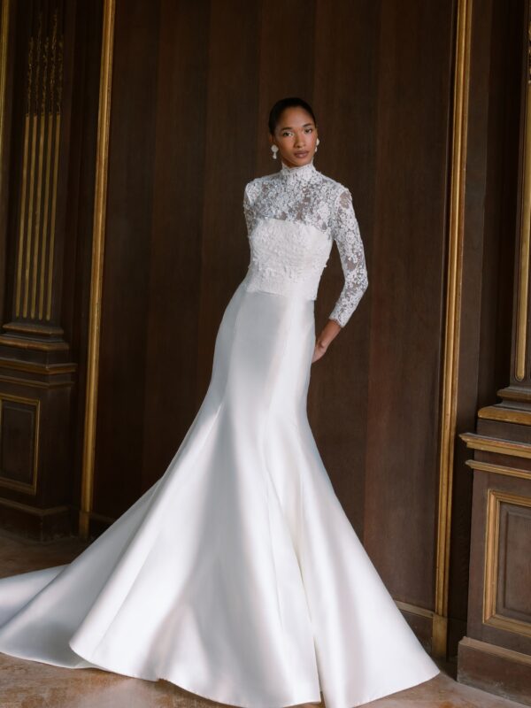 Sareh Nouri Maryanne Wedding Dress - Italian Magnolia straight edge neckline slim flare gown with seamwork detail. Shown with detachable 3D embroidered ¾ length bolero with chantilly trim.