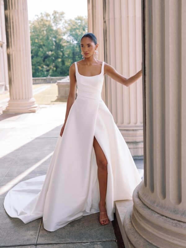 Sareh Nouri Philippa Wedding Dress - Italian Stretch Mikado scoop neck hand draped high slit ball gown with cathedral train and low back twist detail.