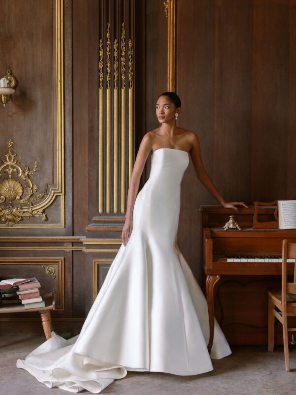 Sareh Nouri Maryanne Wedding Dress - Italian Magnolia straight edge neckline slim flare gown with seamwork detail. Shown with detachable 3D embroidered ¾ length bolero with chantilly trim.