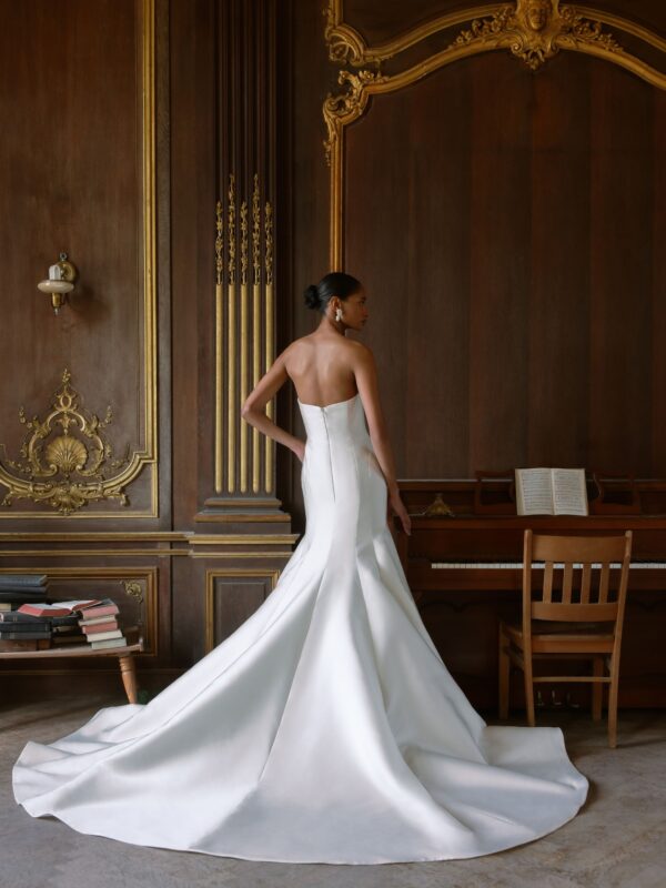 Sareh Nouri Maryanne Wedding Dress - Italian Magnolia straight edge neckline slim flare gown with seamwork detail. Shown with detachable 3D embroidered ¾ length bolero with chantilly trim.