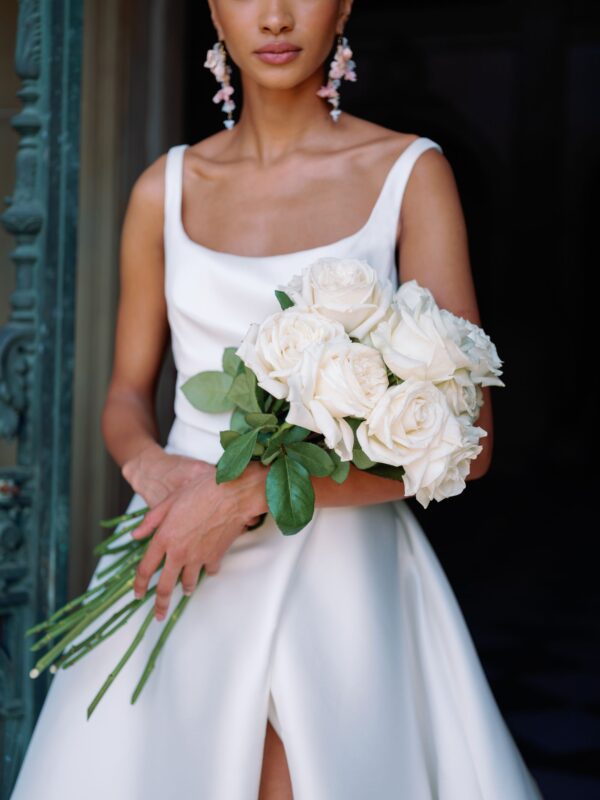 Sareh Nouri Philippa Wedding Dress - Italian Stretch Mikado scoop neck hand draped high slit ball gown with cathedral train and low back twist detail.