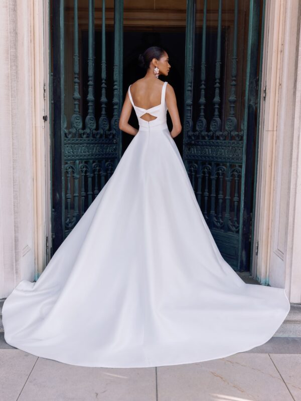 Sareh Nouri Philippa Wedding Dress - Italian Stretch Mikado scoop neck hand draped high slit ball gown with cathedral train and low back twist detail.