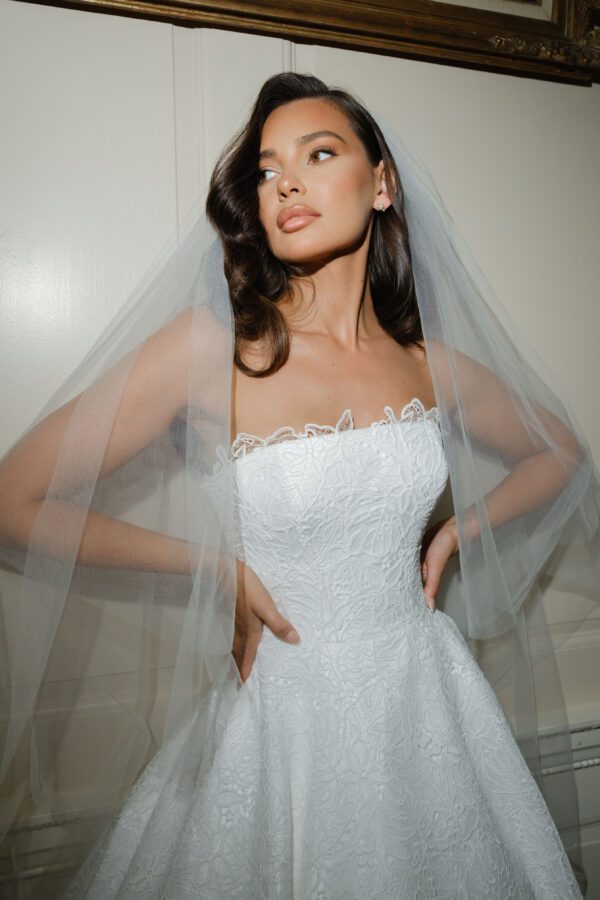 Suzanne Neville Enchanting Wedding Dress - Ballgown style dress with beautiful straight strapless neckline, fitted bodice, and A-Line skirt with allover lace.