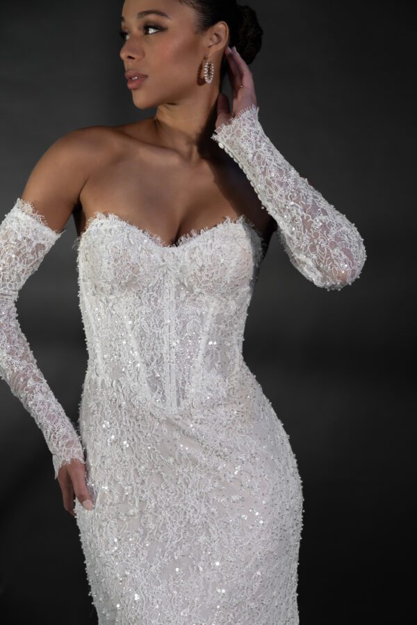Martina Liana 1860 Wedding Dress - Fit and flare style with detachable long sleeves, sweetheart neckline, exposed boning, 3D Floral, and pearl embellishment