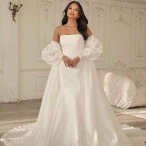 Martina Liana 1901 Wedding Dress - Fit and flare style dress with strapless neckline, boning bodice, fabric-covered buttons and bow detail.