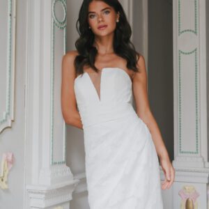 La Premiere Arabella Wedding Dress - A - Line style dress with sweetheart neckline, hand-placed floral appliqués, exposed boning bodice and long sleeves.